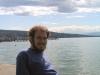 Ben dips his feet in cold Lake Zurich